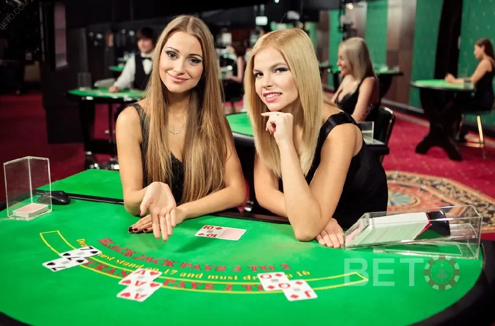 Tampilan meja kasino live dengan dealer di REBAHIN